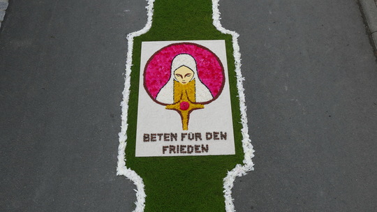 Blumenteppich zu Fronleichnam mit RSK-Logo